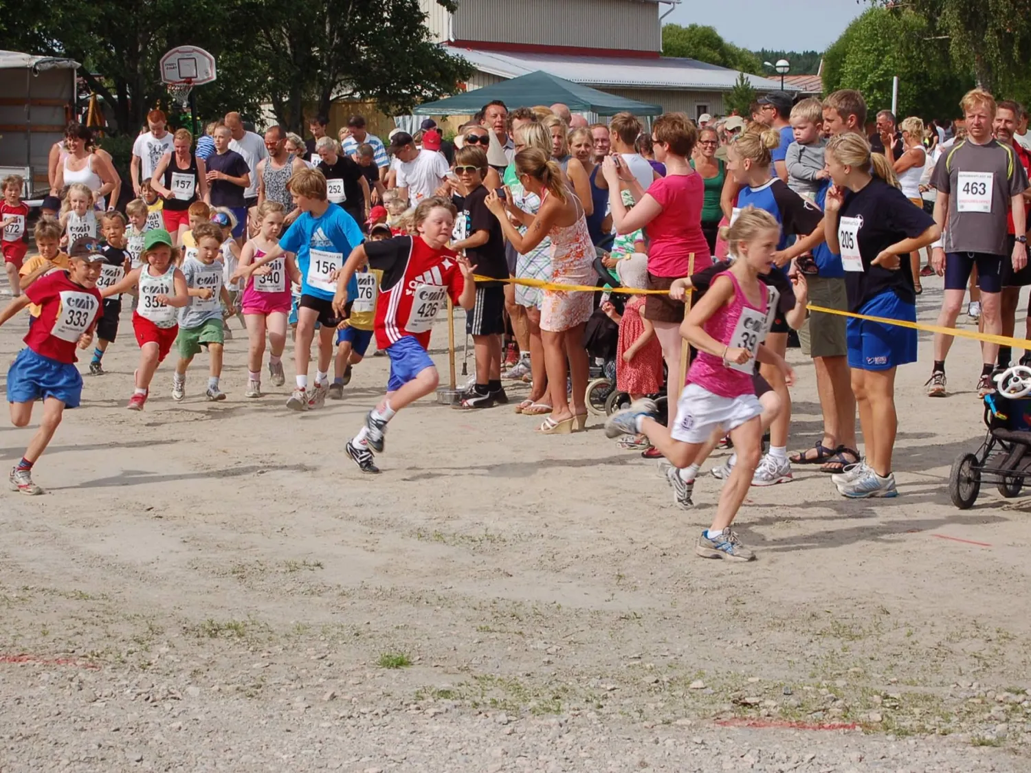 Colour photo of people running in a race.