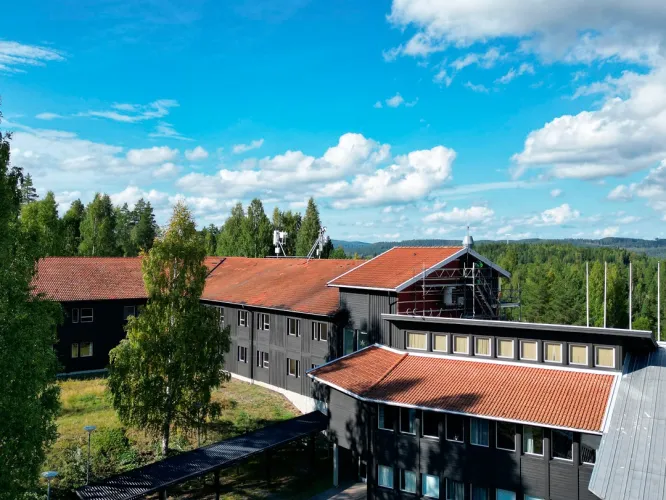 Colour picture - exterior of Lodge Hassela hotel in Hassela, Sweden